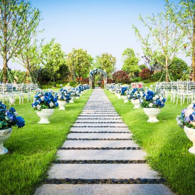 Beautiful wedding flower arrangement of seats along the aisle